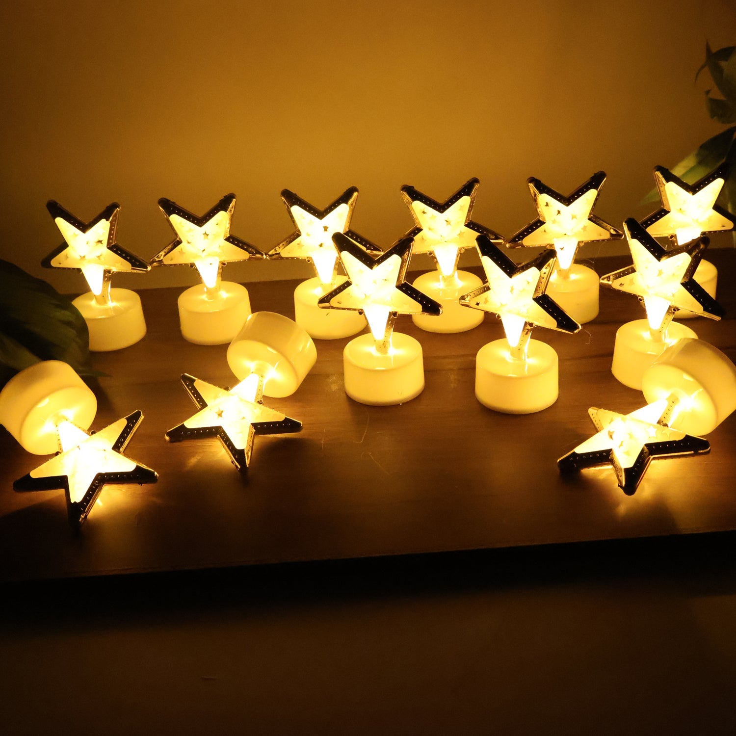 Decorative Star Shaped Flameless LED Candles (12 Pc) Decorative Star Shaped Flameless LED Candles (12 Pc)